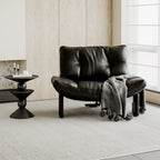 Fauteuil d'appoint contemporain noir en chenille capitonnée sans accoudoirs