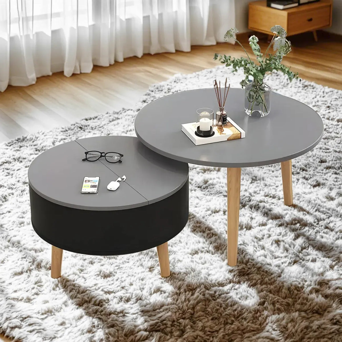 Moderne ronde houten salontafel in zwart-wit met opbergruimte