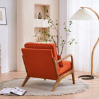 Gestoffeerde accentstoel in midcenturymoderne stijl