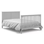 Lit de bébé convertible 5 en 1 avec table à langer et tiroir