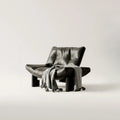 Fauteuil d'appoint contemporain noir en chenille capitonnée sans accoudoirs