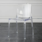 Chaise de salle à manger ambre en acrylique, sans accoudoirs et à dossier bas