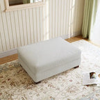 Grand pouf décoratif moderne en velours côtelé