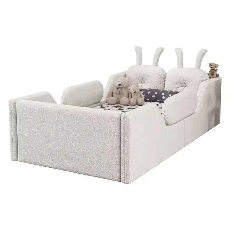 Whisen eenpersoonsbed met platform, gestoffeerd kinderbedframe voor op de vloer met konijnenkussen en afneembare zijhekken