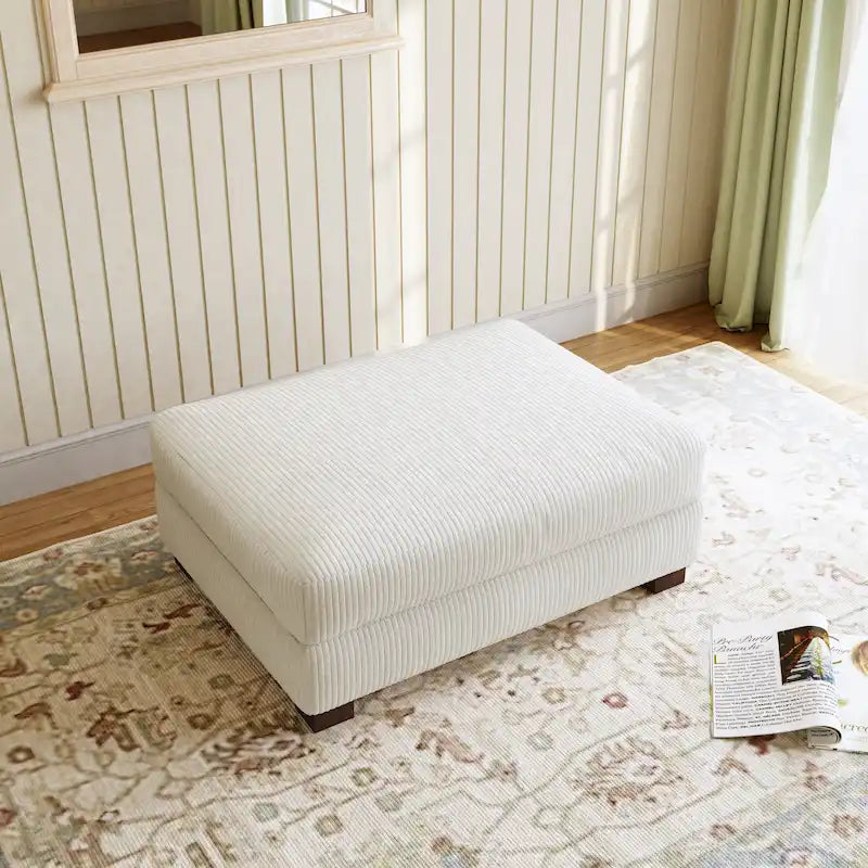 Grand pouf décoratif moderne en velours côtelé