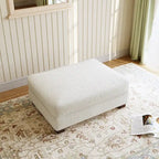 Grand pouf décoratif moderne en velours côtelé