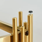 Smalle consoletafel met 2 niveaus, goudkleurig metalen frame en blad van gehard glas