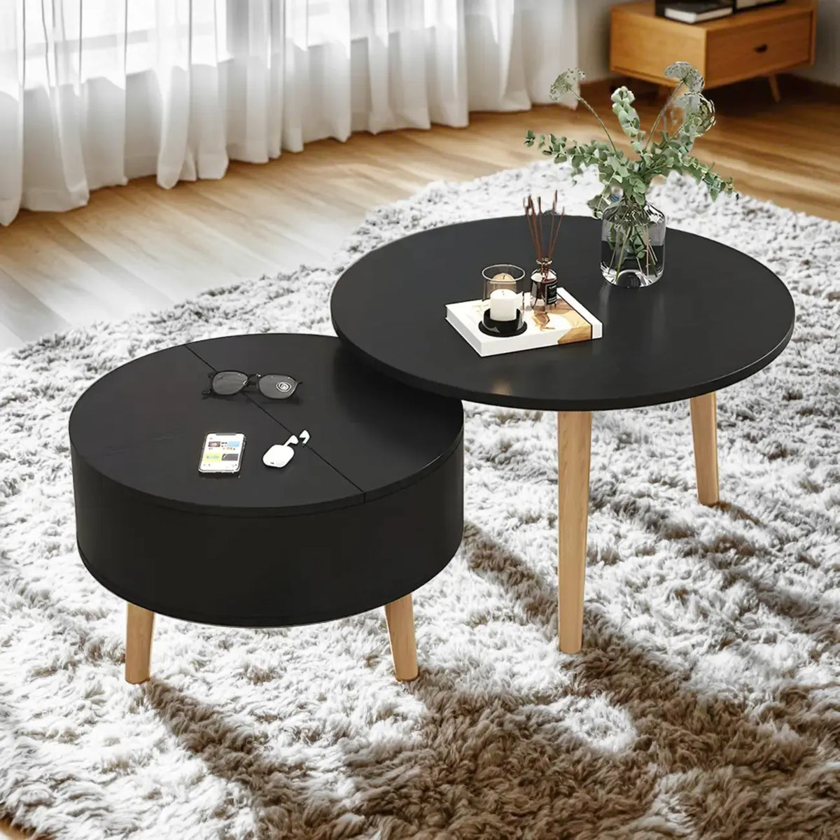 Moderne ronde houten salontafel in zwart-wit met opbergruimte